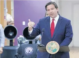  ?? STEPHEN M. DOWELL/AP ?? Gov. Ron DeSantis speaks at the Oh Sooo Jazzy hair salon in Orlando on Saturday.