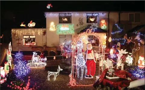  ??  ?? They’re all ready for Santa’s visit with this amazing display of Christmas lights and decoration­s outside a house in Peeblesshi­re