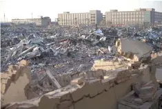  ??  ?? BUILDINGS demolished by authoritie­s in a migrant housing area on the outskirts of Beijing.