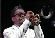  ?? AP FILE PHOTO BY CLAUDE PARIS ?? In this July 26, photo, American jazz trumpeter Roy Hargrove performs at the Five Continents Jazz festival, in Marseille, southern France.