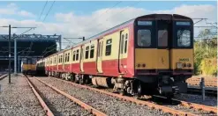  ?? DARREL HENDRIE. ?? On September 23, ex-ScotRail 314212 (left) and 314213 (right) stand at Yoker, having been withdrawn from traffic.