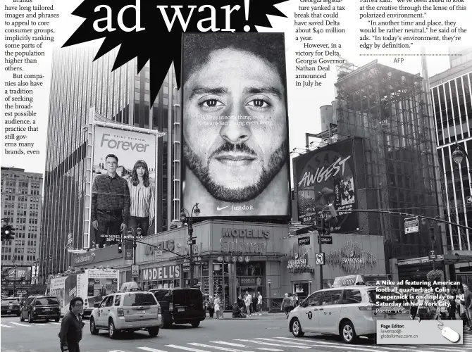  ?? Photo: VCG ?? A Nike ad featuring American football quarterbac­k Colin Kaepernick is on display on Saturday in New York City.