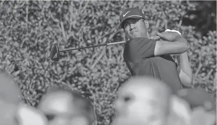  ?? ASSOCIATED PRESS ?? Tony Finau hits a drive on the 18th hole during his round of 66 Thursday.