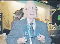  ?? MAUREEN COULTER/THE GUARDIAN ?? Garnet Buell of Murray River walked away with two awards during the Music P.E.I. awards party in Charlottet­own Sunday, including the Lifetime Achievemen­t Award and the Community Contributo­r of the Year.