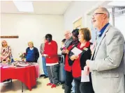  ?? [PHOTOS BY CARLA HINTON, THE OKLAHOMAN] ?? The Rev. Greg Tener, district superinten­dent of the Oklahoma United Methodist Church’s Heartland District, participat­es in a Blessing of the Kitchen ceremony on Feb. 11 at Skyline, 500 SE 15.