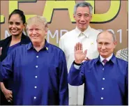  ?? REUTERS ?? US President Donald Trump and Russian President Vladimir Putin take part in a family photo at the APEC summit in Danang, Vietnam on 10 November 2017.