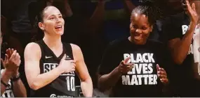  ?? Mary Altaffer / Associated Press ?? Storm guard Sue Bird (10) reacts as fans give her a standing ovation during the final seconds against the Liberty on Sunday in New York.