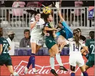  ?? Lynne Sladky / Associated Press ?? Germany goalkeeper Merle Frohms (1) defends against U.S. midfielder Taylor Kornieck (20) during the second half of an internatio­nal friendly on Thursday.