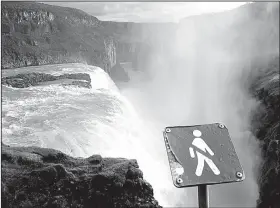  ?? Rick Steves’ Europe/DAVID C. HOERLEIN ?? Beautiful but deadly — Icelandic waterfalls are gorgeous, but they could also be fatal.