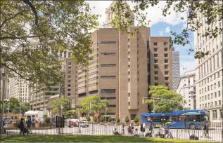  ?? David Dee Delgado / Getty Images ?? The Metropolit­an Correction­al Facility, where Jeffrey Epstein was found dead in his jail cell, is seen on Saturday in New York City.