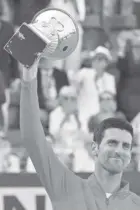  ?? AGENCE FRANCE PRESSE ?? Serbia's Novak Djokovic holds the winner's trophy after winning the final match of the Men's ATP Rome Open tennis tournament against Greece's Stefanos Tsitsipas at Foro Italico in Rome.