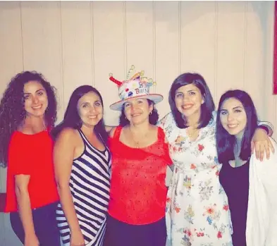  ?? BRENDA CARRILLO / THE WASHINGTON POST ?? Guillermin­a Carrillo, centre, hoped her daughters — from left, Ana Carrillo, Elvia Zarate-Carrillo, Diana Carrillo and Brenda Carrillo — would never experience the kind of discrimina­tion she did when she immigrated from Mexico.