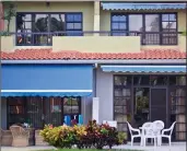  ?? Courtesy photo ?? Awnings can be a worthwhile investment for houses. They can increase usable yard space and protect against sun damage to any outdoor furniture.