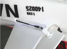  ??  ?? The elevator pushrod is the only pushrod that needs to be snapped into place, and it is retained with a small silicone keeper. The horizontal stabilizer is also taped into place, but the tape is impossible to pick out.