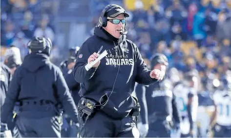  ?? ROB CARR/GETTY IMAGES ?? The Jacksonvil­le Jaguars bought what Doug Marrone, pictured above, was selling when he became the head coach last year. Tougher practices and no pingpong in the dressing room, among others, have paid off for the Jags, as they’re set to take on the New...