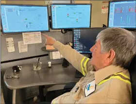  ?? ?? Albert Gonzales monitors pollution control systems Sept. 20 during the final week of operations at the San Juan Generating Station.