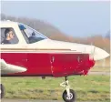  ??  ?? Joe Kinghorn waiting for clearance before taking off