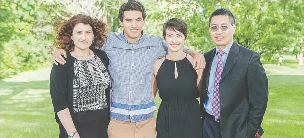  ?? CHAN FAMILY ?? Thomas Chan, second from left, and Andrew at right in a 2014 photo provided by the Chan family.