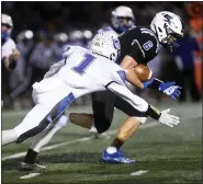  ?? BILL UHRICH — READING EAGLE ?? Exeteri’s Richie Karstien picks up tough yards in the District 3Class 5A final Friday at Don Thomas Stadium.