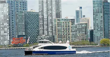  ??  ?? Popular mode of transport: Tourists are fond of the NYC ferries and the chance to take in the magnificen­t Manhattan skyline. — AFP