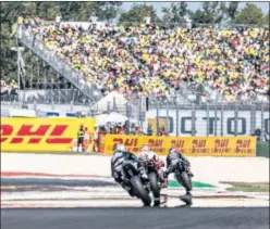  ??  ?? Maverick, Márquez y Quartararo en la carrera de Misano de 2019.