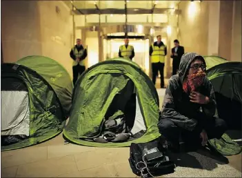  ?? — GETTY IMAGES ?? Anti-capitalist protesters from the Occupy movement set up tents outside the stock exchange in Paternoste­r Square, near St. Paul’s Cathedral, in London.