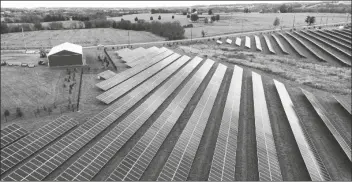  ?? JULIO CORTEZ/AP ?? FARMLAND IS SEEN WITH SOLAR PANELS Thurmont, Md. from Cypress Creek Renewables on Oct. 28, 2021, in