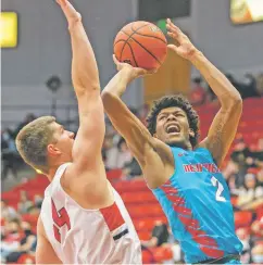  ?? COURTESY UNM ATHLETICS ?? New Mexico guard Saquan Singleton scored a career-high 17 points in the Lobos’ win Wednesday against Dixie State in St. George, Utah.