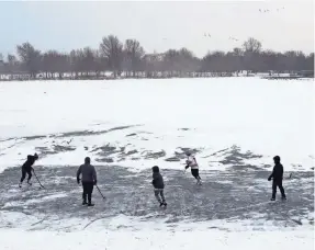  ?? MATT SLOCUM/AP ?? The National Hockey League wants to ensure the future of frozen ponds, such as this one in Philadelph­ia, for new generation­s of young players.