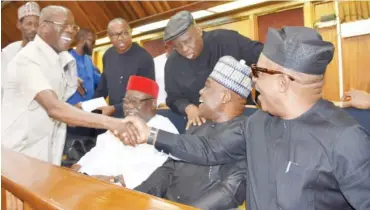  ?? Photo: NAN ?? All Progressiv­es Congress National Chairman, Adams Oshiomhole (left) in a handshake with his Peoples Democratic Party (PDP) counterpar­t, Prince Uche Secondus, during the hearing of the appeal filed by the PDP and its presidenti­al candidate, Atiku Abubakar, challengin­g the victory of President Muhammadu Buhari at the Feb. 23 poll, at the Supreme Court in Abuja yesterday