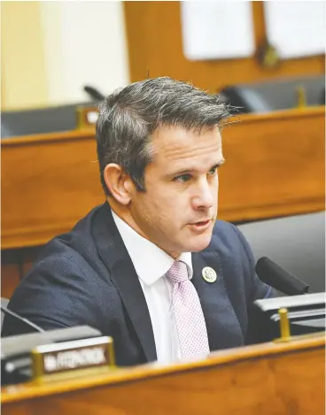  ?? KEVIN DIETSCH / POOL / AFP VIA GETTY IMAGES FILES ?? Adam Kinzinger received a handwritte­n letter from a cousin, signed by several other
family members, decrying his decision to support Donald Trump’s impeachmen­t