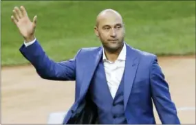  ?? SETH WENIG — THE ASSOCIATED PRESS ?? Former New York Yankees shortstop Derek Jeter is leading a group that reached an agreement Saturday to buy the Miami Marlins from owner Jeffrey Loria.