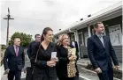  ?? BRADEN FASTIER/STUFF ?? Prime Minister Jacinda Ardern and key Labour MPs visit a Ka¯ inga Ora home in Richmond, during the Labour caucus meeting in Nelson.