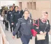  ?? PHOTO: REUTERS ?? Suspected supporters of the USbased cleric Fethullah Gulen are escorted to a courthouse in Bursa, Turkey, yesterday.