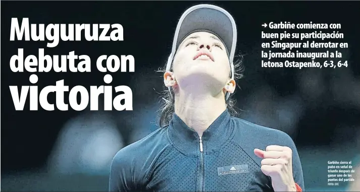  ?? FOTO: EFE ?? Garbiñe cierra el puño en señal de triunfo después de ganar uno de los puntos del partido