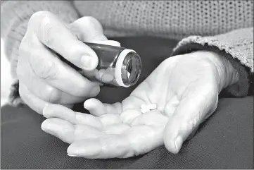  ?? Ocskay Mark/Dreamstime/TNS ?? As concern grows about a national opioid epidemic, some seniors now find it harder to get medication­s they need from doctors and pharmacies.