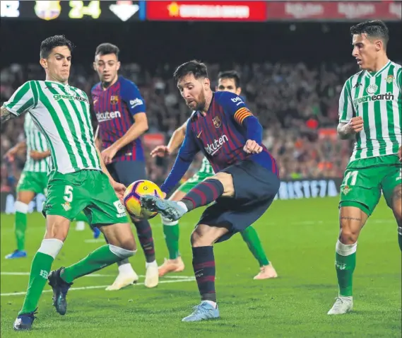  ?? FOTO: AP ?? Messi regresó al equipo después de perderse dos partidos de Liga La presencia del argentino fue productiva en goles pero no bastó para ganar a un gran Betis