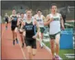  ?? GENE WALSH — DIGITAL FIRST MEDIA ?? North Penn’s Brendan O’Toole and Pennridge’s Matt Eissler compete in the 4x800 Tuesday.