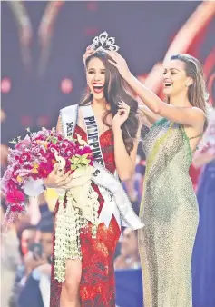  ?? — Reuters photo ?? Miss Philippine­s Catriona Gray is crowned Miss Universe during the final round of the Miss Universe pageant in Bangkok, Thailand, Sunday.