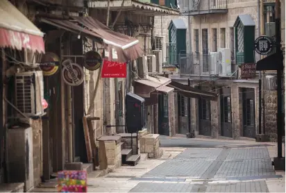  ?? (Yonatan Sindel/Flash90) ?? VIEW OF an empty street in downtown Jerusalem yesterday.