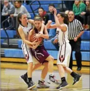  ?? AUSTIN HERTZOG - DIGITAL FIRST MEDIA ?? Boyertown’s Kylie Webb, left, fouls Garnet Valley’s Nicole Barnes while trying to force a turnover as Alli Marcus joins the double-team Thursday.