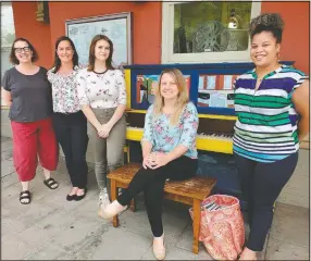  ??  ?? Culpeper Visitor Center Supervisor Kristi Mashon, (from left) Tourism Director Paige Read, piano artist Jordan Wilson, Bache and Culpeper marketing specialist Megan Gray are seen during the unveiling ceremony for the town’s first public piano.