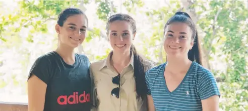  ??  ?? EYE-OPENING: St Monica's College students Charlotte Gregory, Eliza Dalziel and Aleerah Zammit volunteere­d in Nepal.