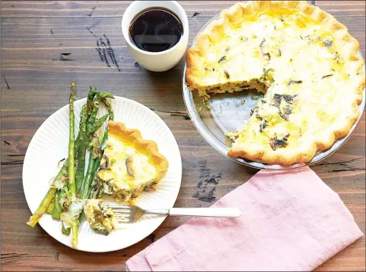  ??  ?? This April 2018 photo shows a leek, mushroom and goat cheese quiche in New York. (AP)