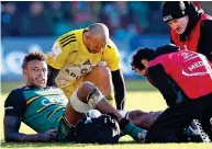  ?? REUTERS ?? Down and out? Lawes has treatment on his left calf at Franklin’s Gardens