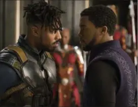  ?? MATT KENNEDY/MARVEL STUDIOS-DISNEY VIA AP ?? Michael B. Jordan, left, and Chadwick Boseman in a scene from Marvel Studios’ “Black Panther.”