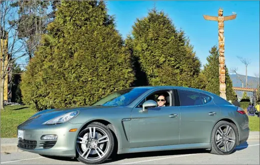  ?? PHOTOS BY IAN SMITH/ PNG ?? Vancouver TV/ radio host Michael Eckford behind the wheel of a 2012 Porsche Panamera S Hybrid in Stanley Park.