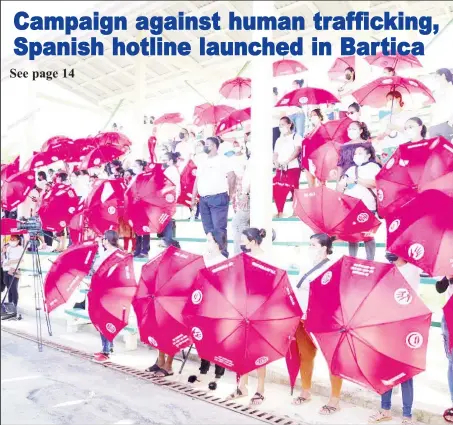  ?? (Ministry of
Human Services photo) ?? These umbrellas carried the hotline numbers to report Traffickin­g in Persons crimes