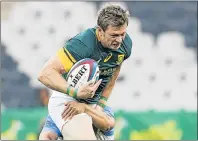  ?? Picure: GALLO IMAGES ?? STRONG RUN: Springbok Ruan Combrinck charges through before fracturing his leg against the Pumas