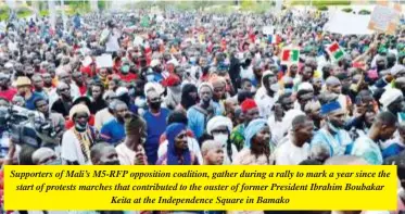  ?? ?? Supporters of Mali’s M5-RFP opposition coalition, gather during a rally to mark a year since the start of protests marches that contribute­d to the ouster of former President Ibrahim Boubakar Keita at the Independen­ce Square in Bamako